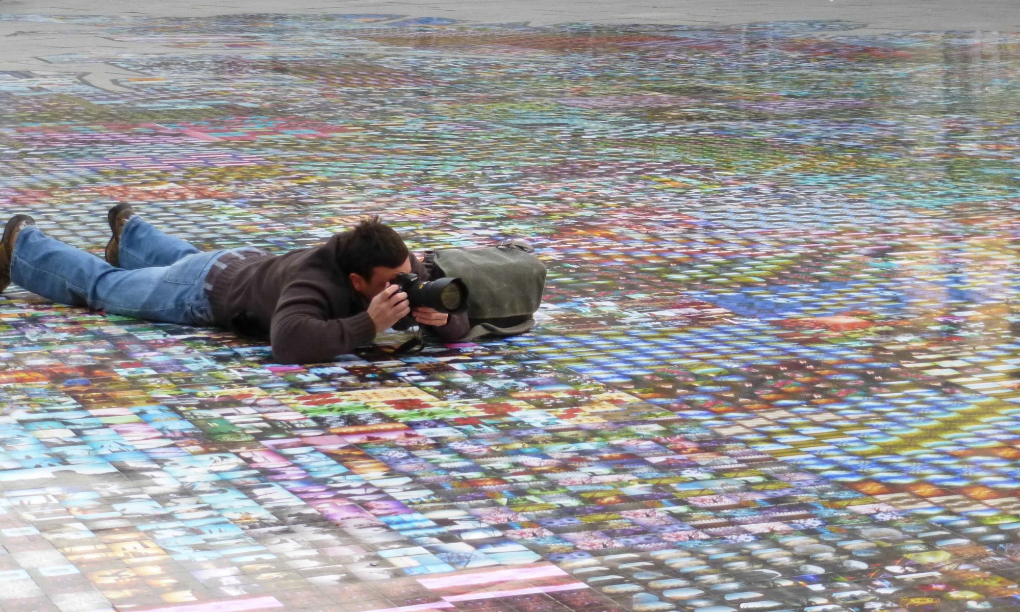 Fotograf auf Bilderteppich zur photokina (©J.Nüsser)